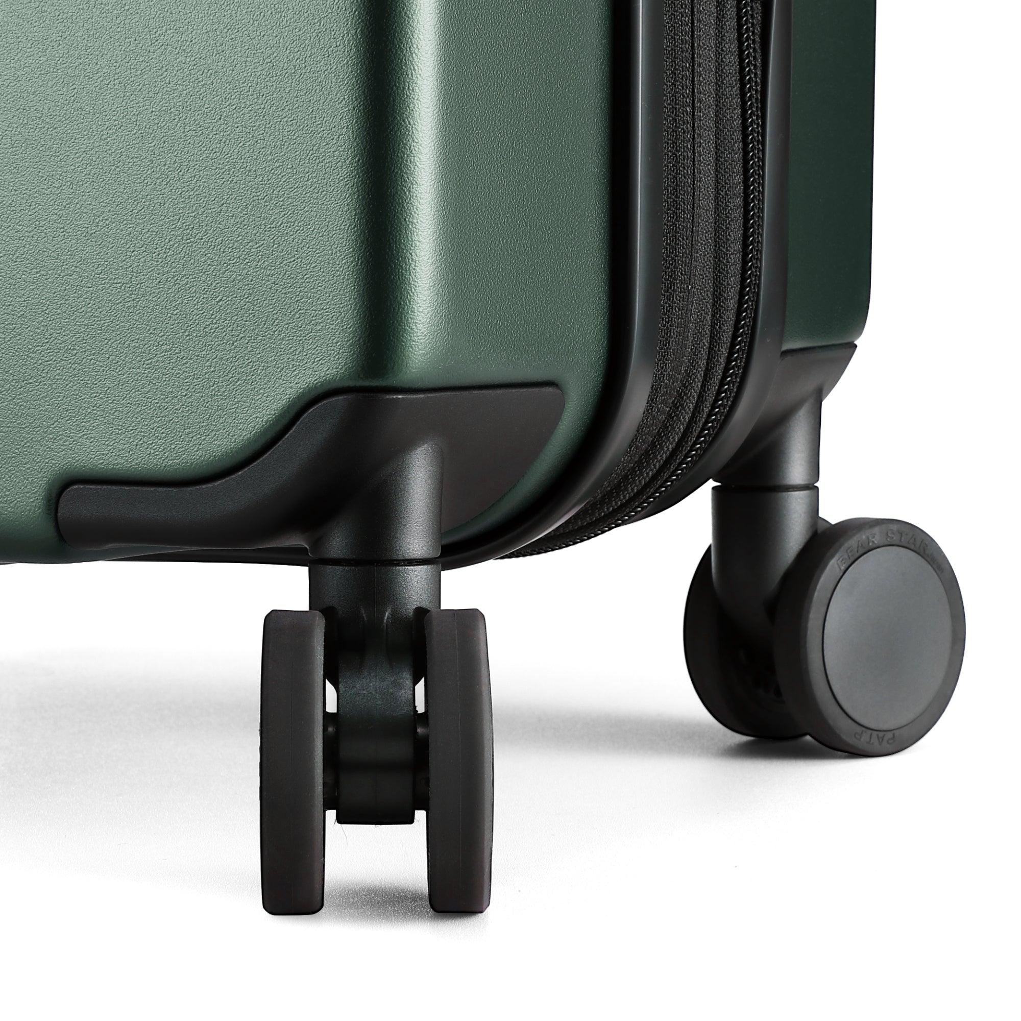 Close-up of 360-degree quiet spinner wheels on Luggex FLO 5 Core carry-on suitcase for smooth, silent travel. 