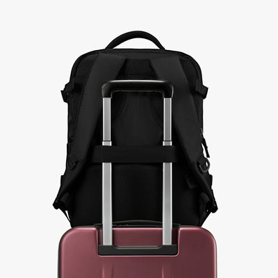 Close-up of ergonomic top handle on LUGGEX FLO 5 Core 20-inch carry-on suitcase for comfortable lifting and bag-friendly. 