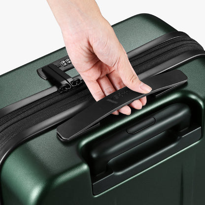 Close-up of ergonomic top handle on Luggex FLO 5 Core 20-inch green carry-on suitcase for comfortable lifting. 
