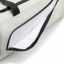 Dedicated waterproof compartment keeps damp clothes contained and separate from clean gear. 