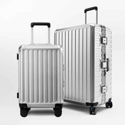 Front view of the LUGGEX ZX Series aluminum-frame zipperless luggage set featuring 20-inch carry-on and 28-inch check-in suitcases in sliver grey, built for durability and modern travel.
