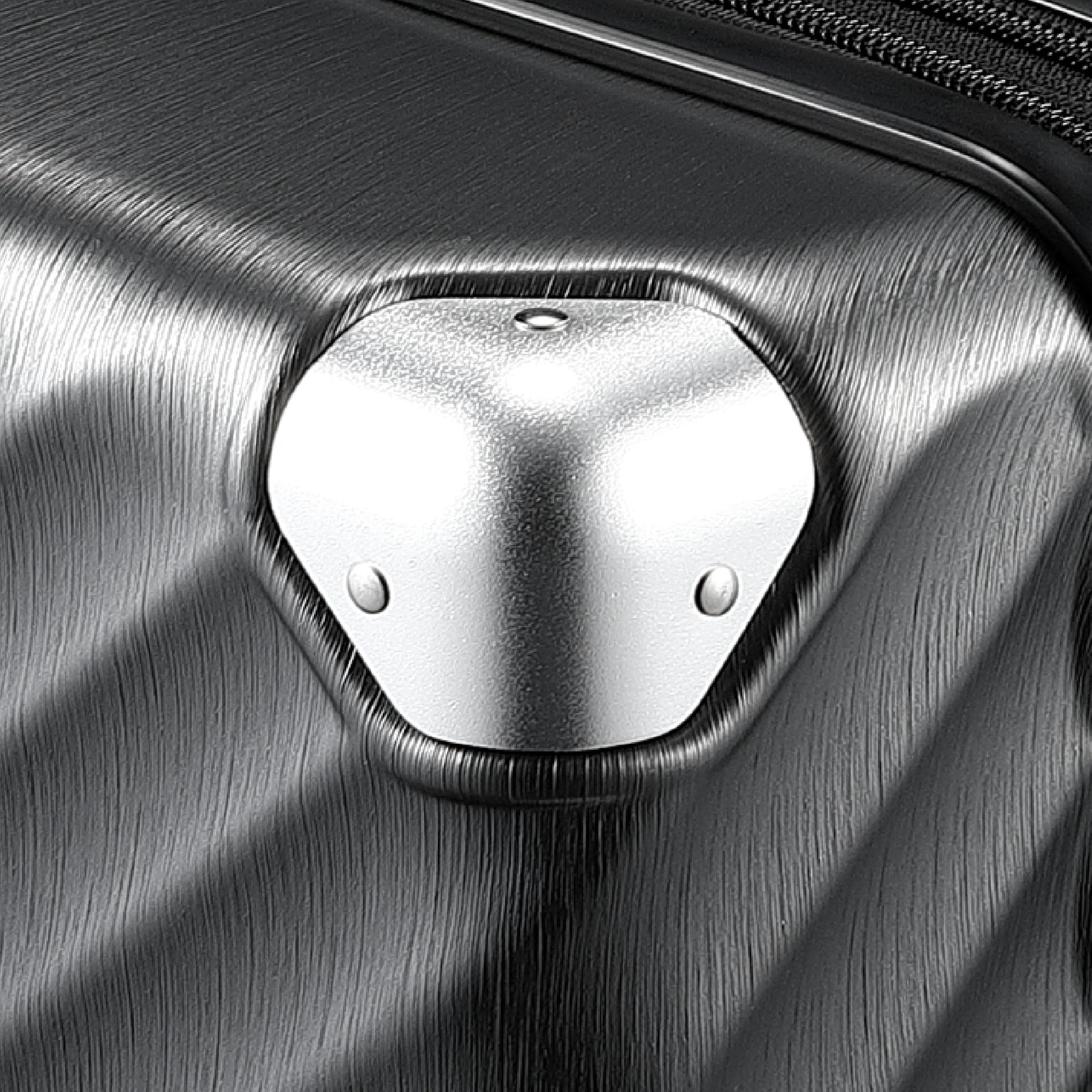 LUGGEX trunk check-in suitcase with reinforced aluminum corner protection designed to help guard against impacts during travel. #show #color_black