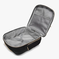 Interior view of a 16-inch underseat carry-on luggage without the laptop compartment, showing a spacious main compartment with compression straps and mesh pocket.
